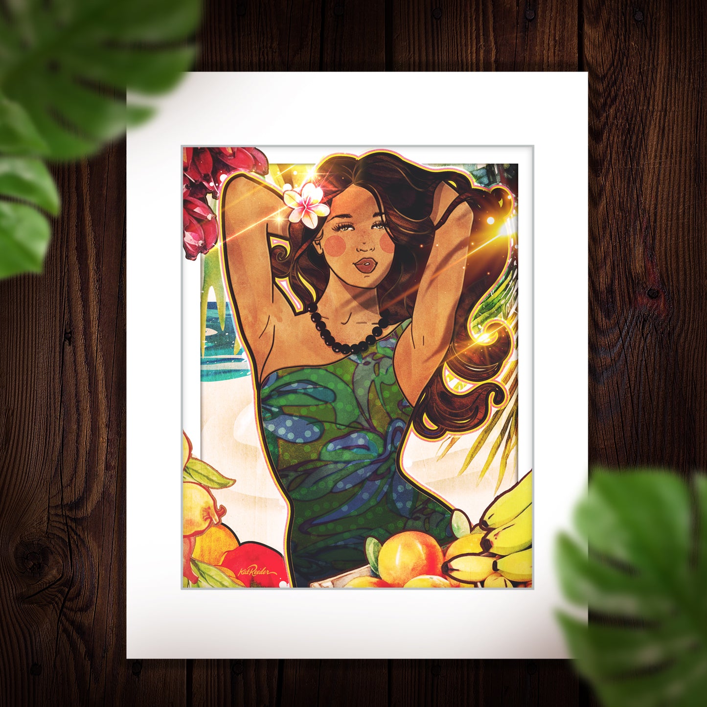 matted print flat lay visual of a vintage style print featuring a dark haired woman with long lush hair, her arms are behind her head. She wears a mod style dress and a plumeria in her hair. She is framed with various hanging fruits. 