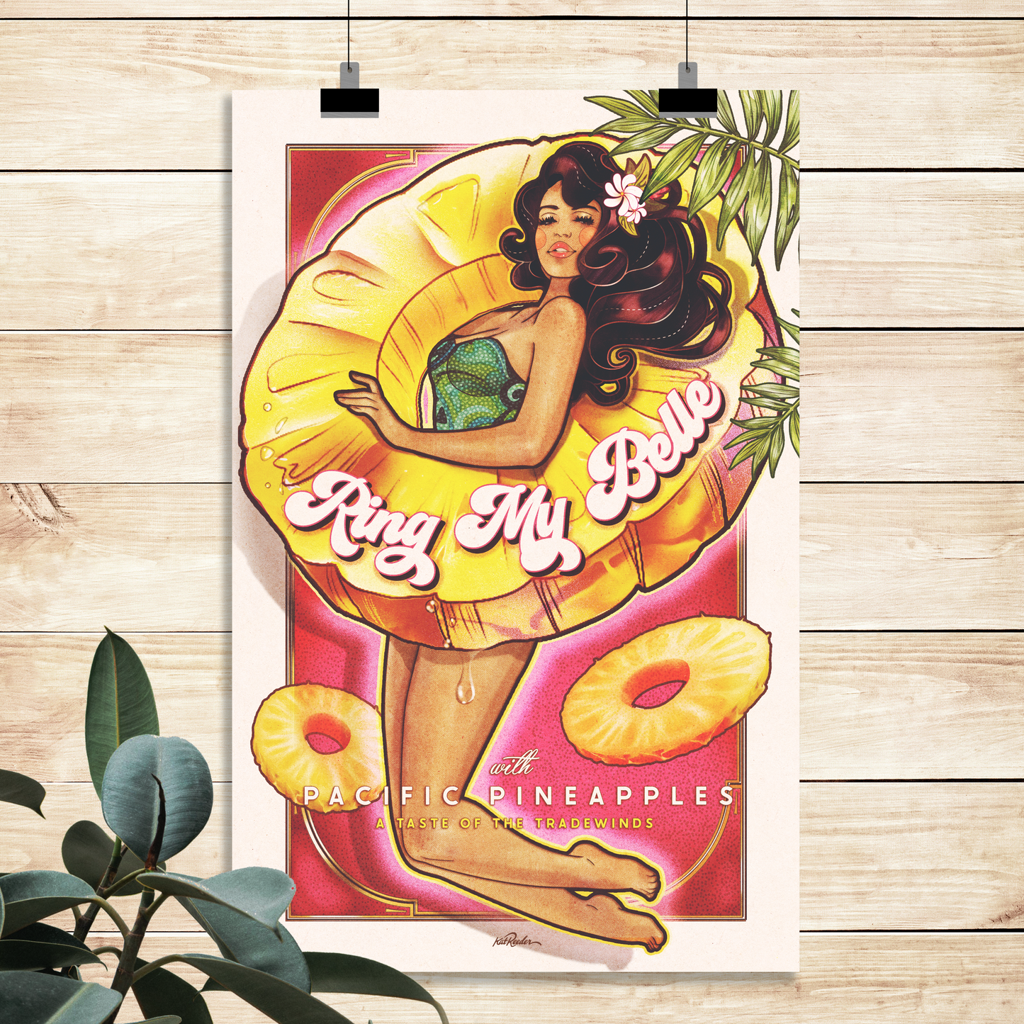 flat lay mockup of a vintage style pin up poster featuring a woman with a pinapple ring. This vintage fruit poster is in the style of american pin up and art nouveau