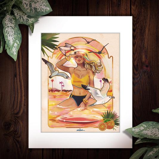 11x14 matted print featuring a 70s inspired illustration of a blonde surfer girl, sitting on a surfboard on a beach at sunset surrounded by seagulls and glowing sky. 